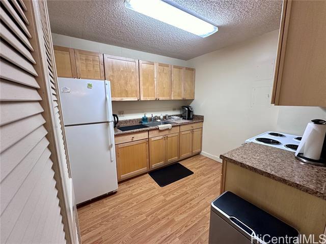 Building Photo - 98-1034-1034 Moanalua Rd