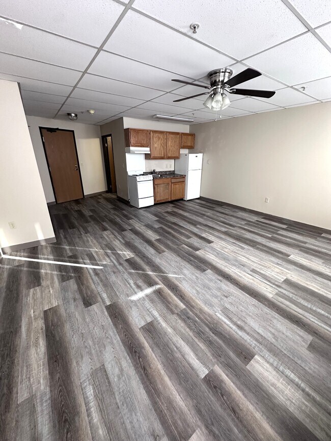 Eficiencia - Madison Street Apartments