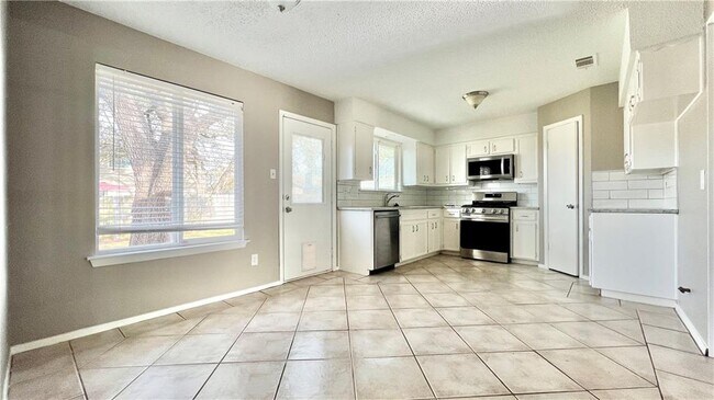 Foto del edificio - 11909 Hardwood Trail