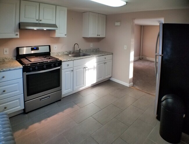 Another view of kitchen showing entry to living room. - 7 S Hillside Ave
