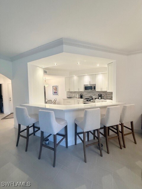 Foto del edificio - 7056 Pelican Bay Blvd