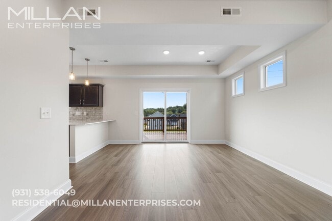 Building Photo - Spacious And Updated Home Featuring Open F...