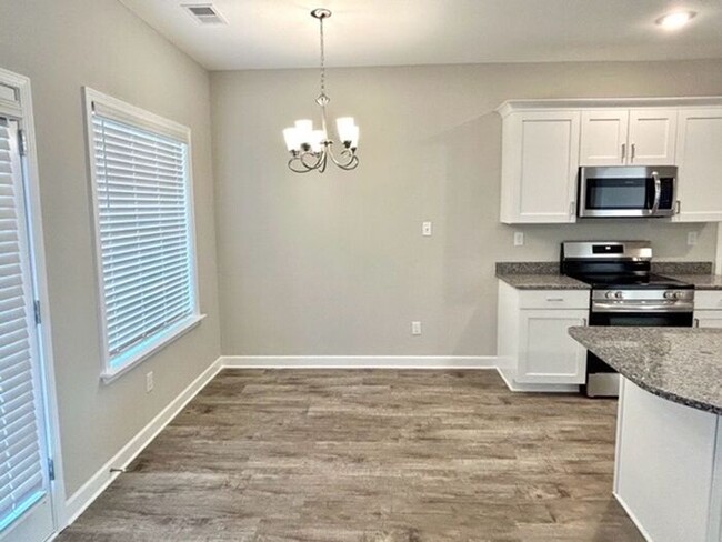 Building Photo - Now Leasing a in Millington @ Windstone Es...