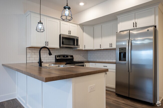 3 BR, 2.5 BA - 1498 pies cuadrados - The Vue at Rivertown Park Townhomes