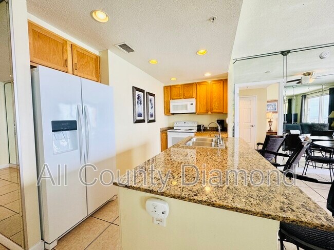 Foto del edificio - 12011 Front Beach Rd