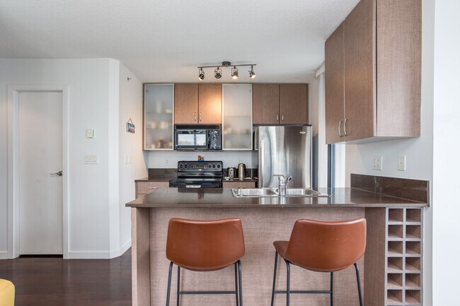 Photo du bâtiment - 1207-909 Mainland