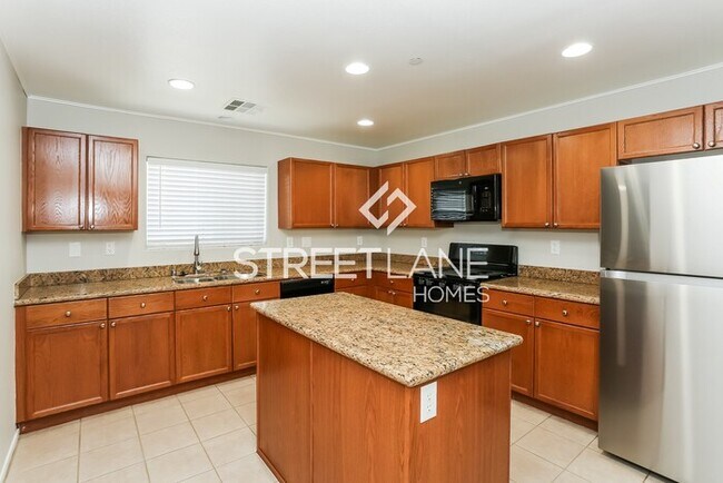 Building Photo - REDUCED! Tri-Level 4 Bedroom Ready to Call...