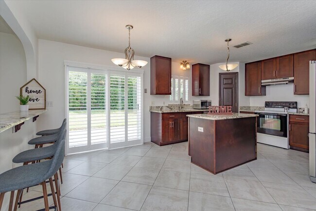 Building Photo - Comfort Meets Style in This Spacious Corner-Lot Home with Bonus Flex Room