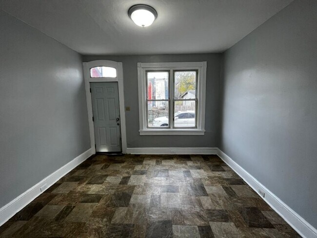 Building Photo - 2 bedroom 1 bath with walk up attic