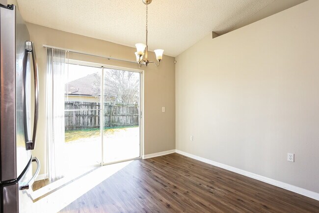 Building Photo - 7288 Lawn Tennis Ln