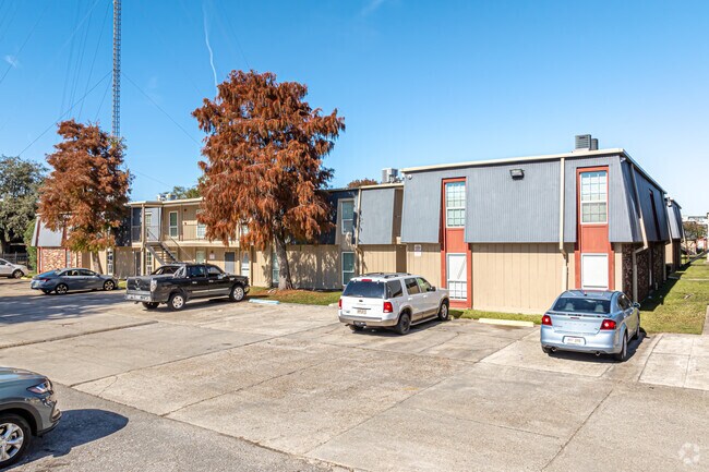 Building Photo - Whispering Palms Apts