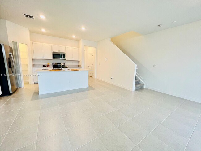 Foto del edificio - 6939 Harbours Edge Ave