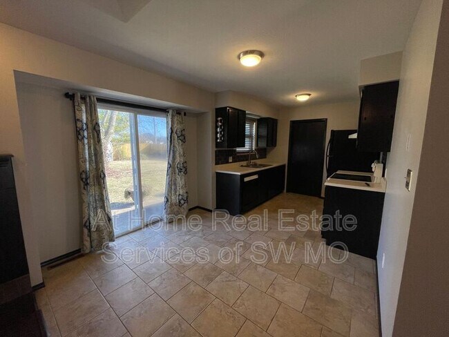 Building Photo - 5792 S Ferguson Ave