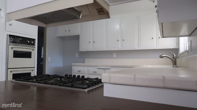 Foto del edificio - 4 br, 2 bath House - 9548 Rhea Ave