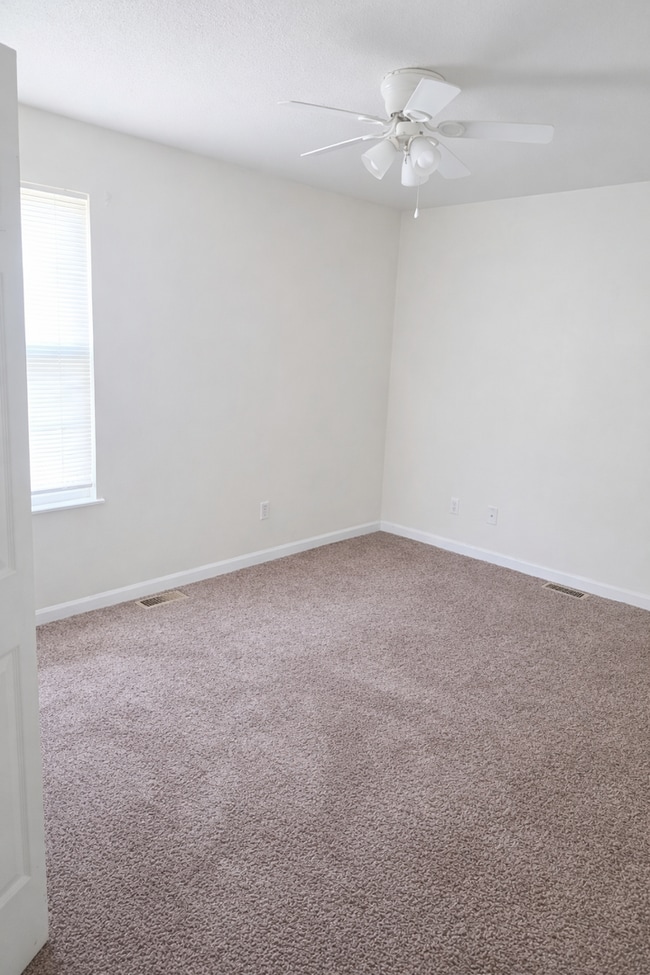 Building Photo - Spacious 2 Bed Downstairs Unit – W/D Hookups, Stove, Refrigerator, Water & Trash Included