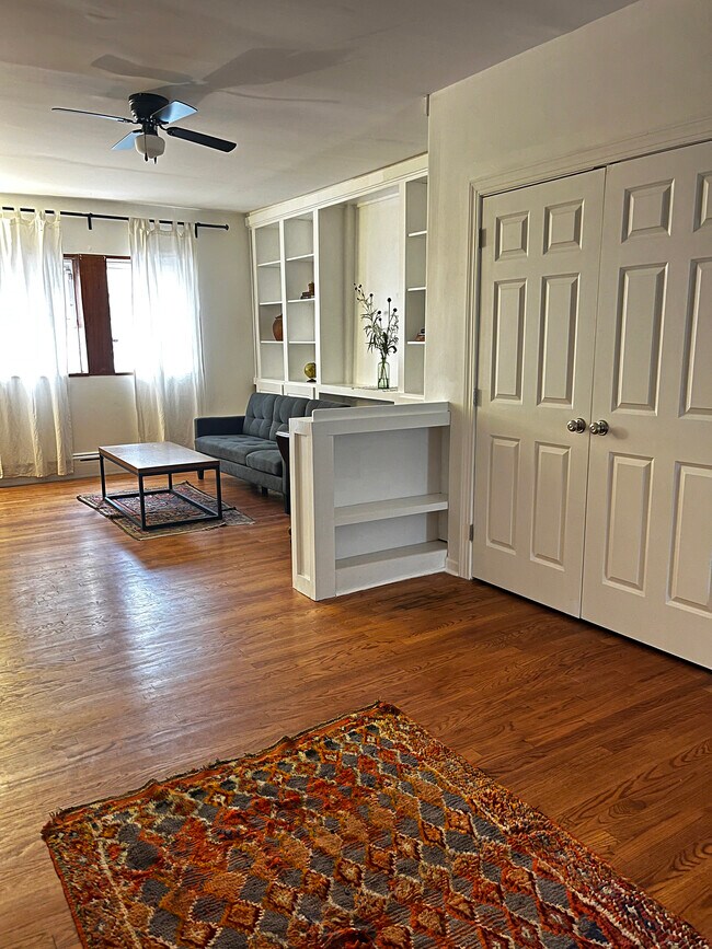View from dining room into living room - 402 Morris St