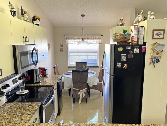 Foto del edificio - 3510  Ridge Tree Court  Greenacres Fl 33463
