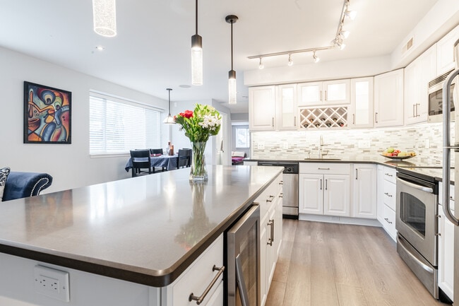 Huge 6.5' kitchen island with built-in wine cooler. - 1620 29th St SE