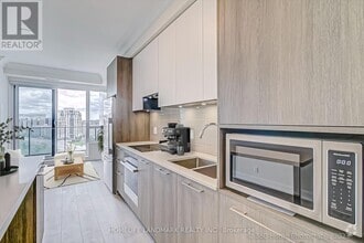 Building Photo - 8-1108 Water Walk Dr