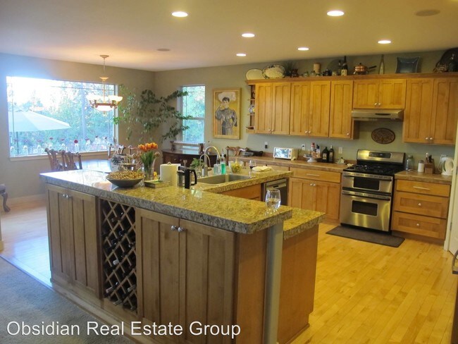 Foto del edificio - 4 br, 3.5 bath House - 1957 NW JACK LAKE CT