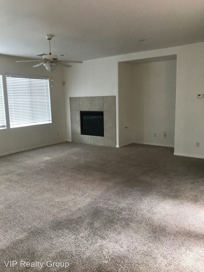Building Photo - 4 br, 3.5 bath House - 7408 Midnight Rambler