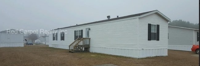Building Photo - 2943 Trace - gated mobile home community!