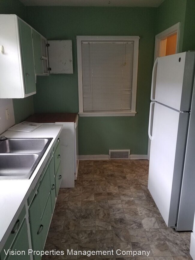 Building Photo - 4 br, 2 bath House - 1413 Calihan Ave NE