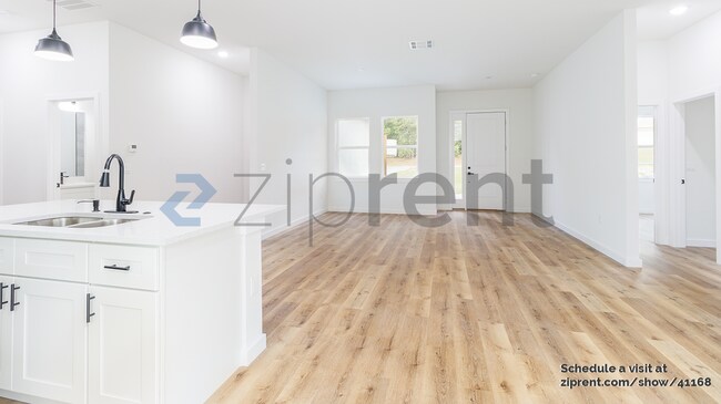 Building Photo - 8202 N Triana Dr