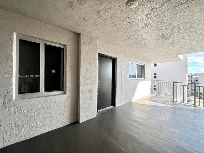 Building Photo - 9915 W Okeechobee Rd