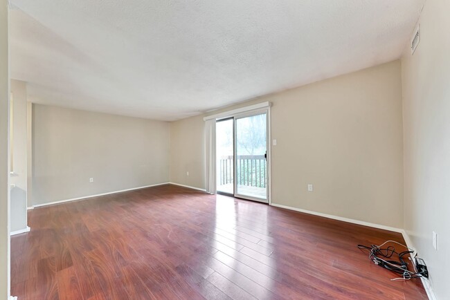 Building Photo - Tranquil Two-Bedroom Condo: Park Setting, ...