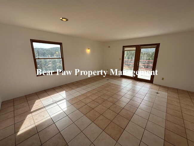 Building Photo - "Charming 1-Bedroom Duplex Retreat in Scenic Conifer!"