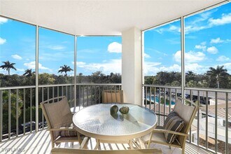 Building Photo - 6361 Pelican Bay Blvd