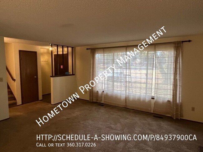Building Photo - Tri-Level Home with Private Backyard-Avail...