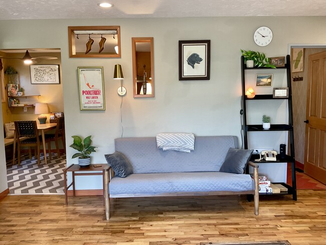 living room / kitchen - 8564 N Richmond Ave