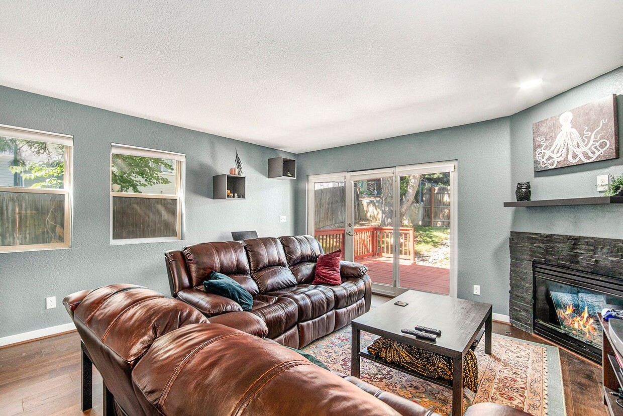 Primary Photo - End Unit Townhome with Large Patio and Amb...