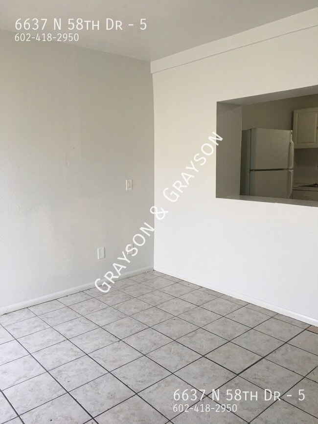 Photo - 6637 N 58th Dr Apartment