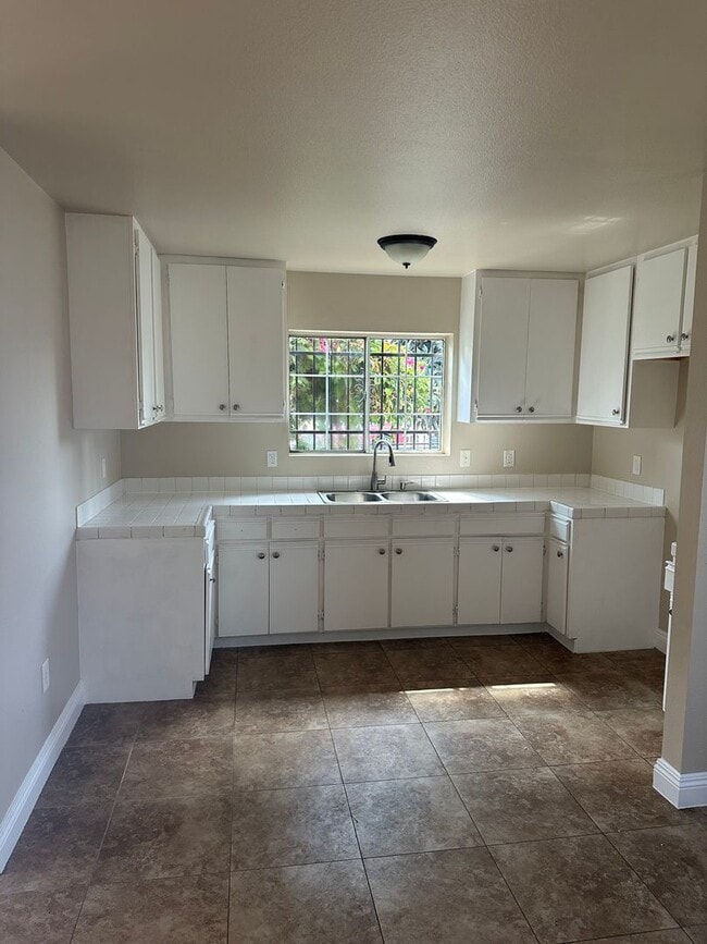 Photo - 647 1/2-1619-1612 E 111th St Apartment