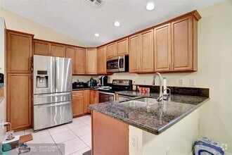 Building Photo - 2421 NW 72nd Ave