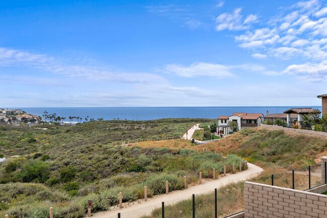 Building Photo - Exquisite coastal estate showcasing stunni...
