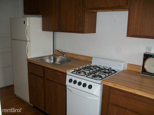 Building Photo - Studio, 1 bath Condo - 3024 N Halsted St