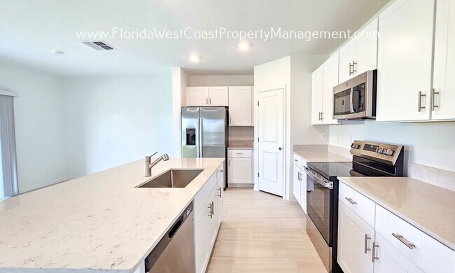 Foto del edificio - BRAND NEW 4 BEDROOM HOME AT SEAAIRE PARRIS...
