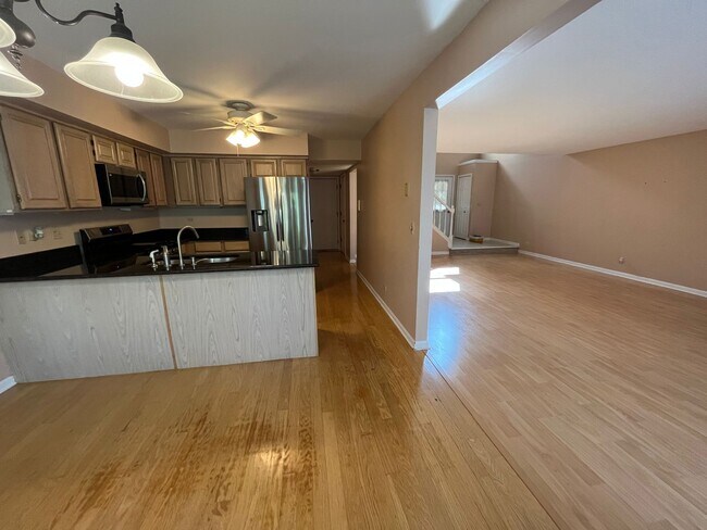 Kitchen with Brand New SS Appliances and Granite Countertops - 4891 Turnberry Dr