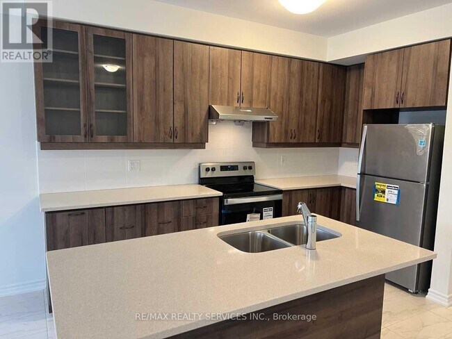 Photo du bâtiment - 40 Spinland St