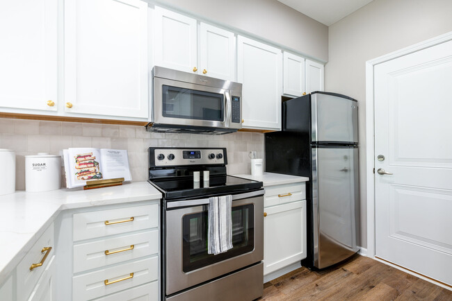 Experience culinary creativity in this sleek, modern kitchen. - The Gramercy New Albany