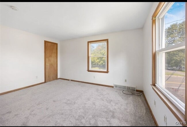 Building Photo - 5696 Caughdenoy Rd