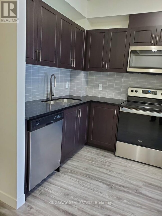 Building Photo - 128 King St N