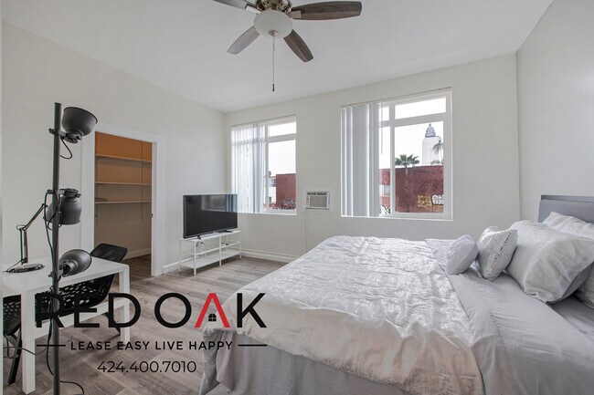 Building Photo - $200 OFF Each Month! Stylish Two Bedroom w...