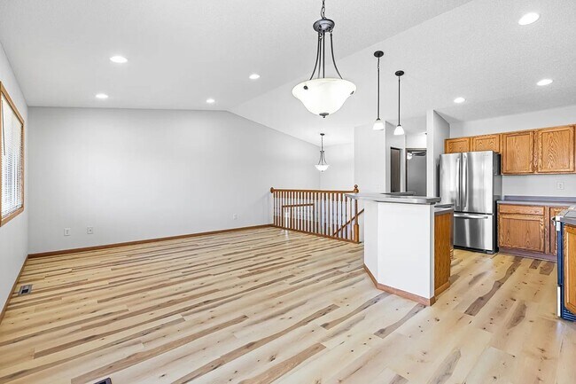 Building Photo - Spacious Family Home Featuring Deck, Garage & Updated Finishes