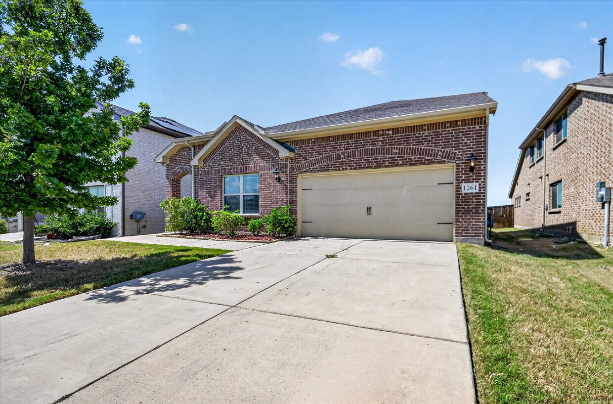 Photo - 1261 Rosebush Rd, Aubrey, TX 76227
Welcome to this spacious 6-bedroom, 3-bathroom home in the desir