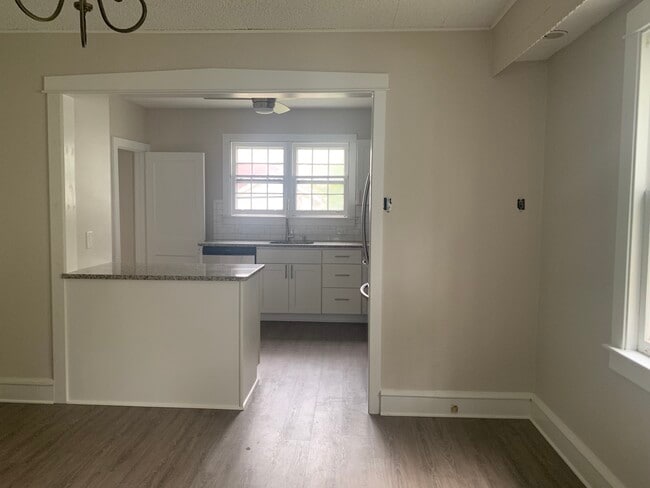 New kitchen cabinets, granite counter top, flooring and more! - 126 E. Ormond Ave